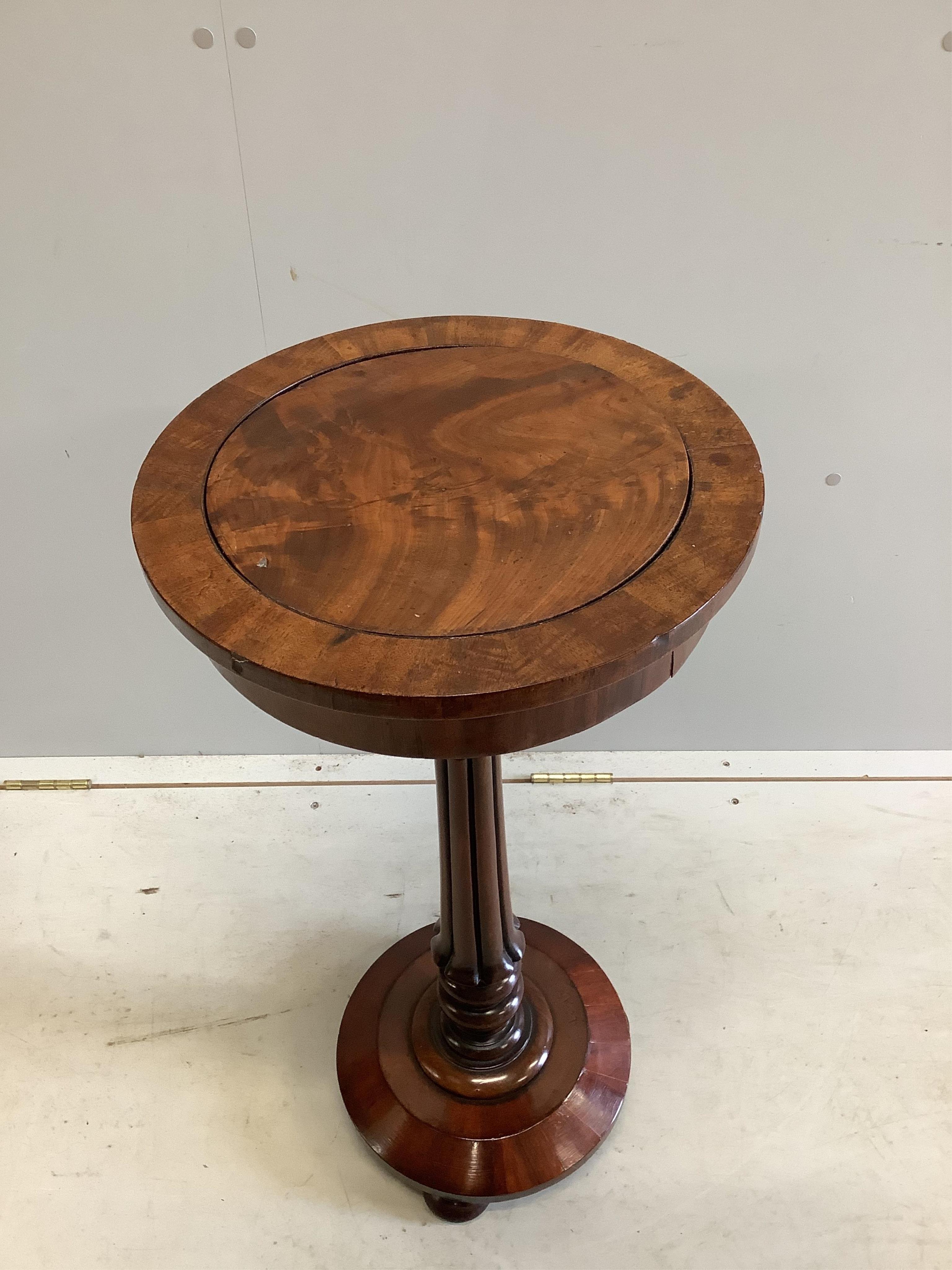 A William IV circular mahogany wine table, diameter 37cm, height 78cm. Condition - fair